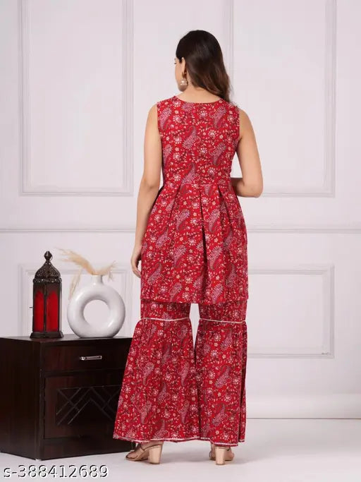 women's red rayon sharara set with dupatta, printed ethnic kurta and bottomwear on display