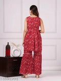 women's red rayon sharara set with dupatta, printed ethnic kurta and bottomwear on display