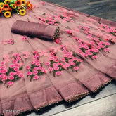 Trendy net saree with heavy embroidery and moti lace border, unstitched silk blouse piece. Formal and traditional Indian attire, perfect for festivals or office wear