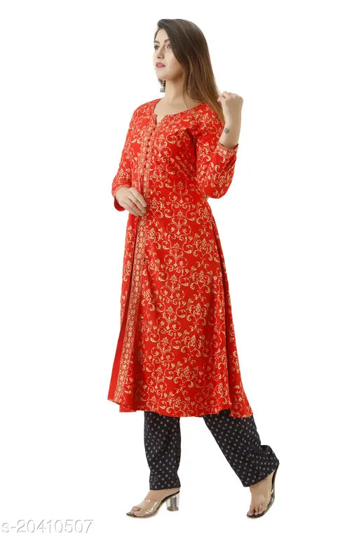 Multi-colored rayon kurti palazz set for women & girls, features printed net design and three-quarter sleeves. Available in sizes S to XXXL from India