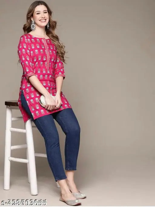 Premium rayon flower printed pink short kurti, soft, lightweight, and breathable design perfect with jeans or traditional bottoms. Available in XS - XL sizes, easy to care for, made in India