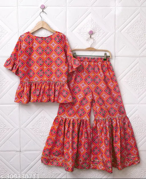 Cotton blend sharara crop top & crepe sharara dress for girl, dyed/washed in net dupatta. Versatile for festive occasions like Diwali, Eid, Christmas, or birthdays. Custom orders available. Indian origin