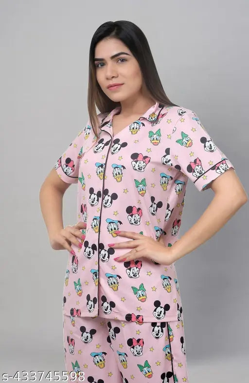 Pink polycotton printed shirt and pyjama set, stylish half-sleeve top with relaxed fit and matching elastic-waist bottoms, irresistible women's nightsuit for bedtime routine, vibrant Indian-made design