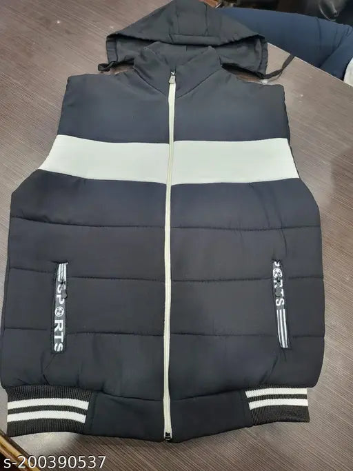 Polyester colorblocked unisex winter jacket for girls and boys, sleeveless design with cap. Two color shades, suitable for casual wear on normal days. Available in sizes 10-16 years. Made in India