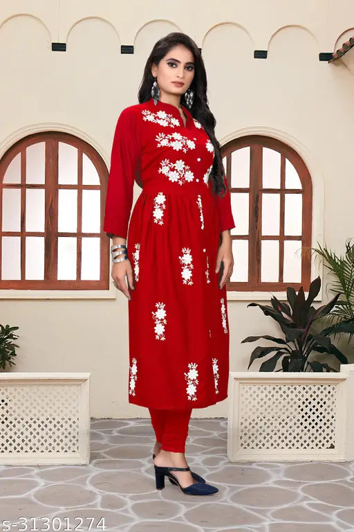 Rayon embroidered three-quarter sleeve kurti for women, attractive Indian fashion on model