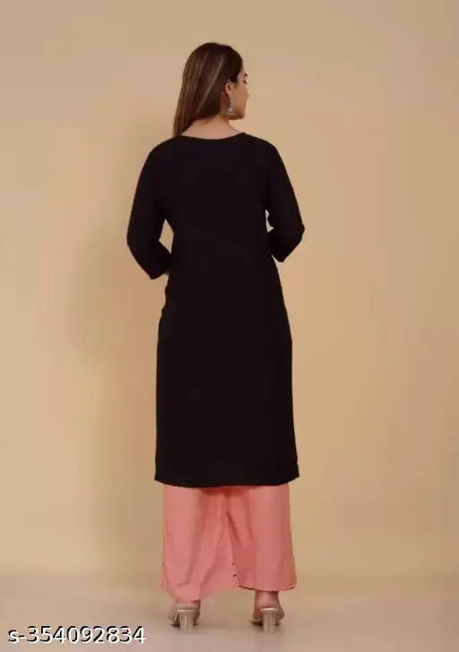 Black Embroidered Kurta with Peach Plazzo Set, Rayon fabric, three-quarter sleeves. Indian embroidery on women's fashion