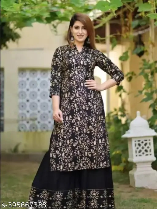 Printed rayon kurta sharara sets in three-quarter sleeves, pack of 2 sizes: M, L, XL, XXL. Indian ethnic wear on model