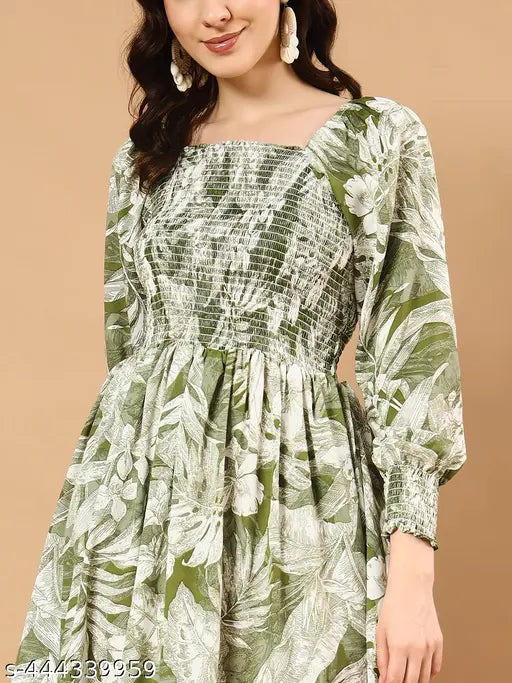 Printed green crepe three-quarter sleeve blouse on mannequin, India-made fashion for women, XS to XXL sizes available