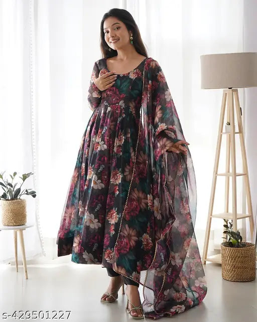 Black georgette printed women's gown with long sleeves, vibrant floral pattern, ideal for special occasions, quality fabric, size: S-XXXL