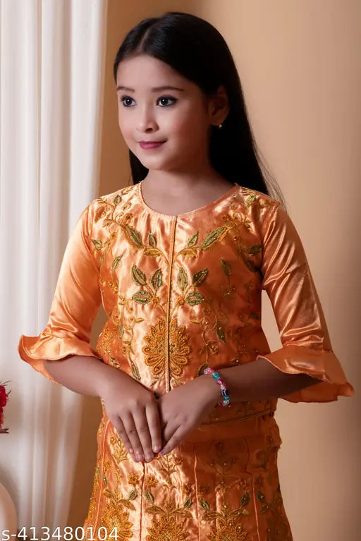 Modern fancy satin-cotton blend kids' lehenga cholis, embroidered with ruffles and sequins, ideal for parties or weddings
