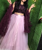 Pink jute silk and net lehenga choli with embellished top and ruffled dupatta, trendy Indian traditional wear
