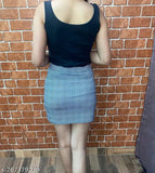 Cotton blend checked skirt, fitted & smoothing, soft ribbed fabric with high waistband and raw edge hem. Available in sizes 26-32