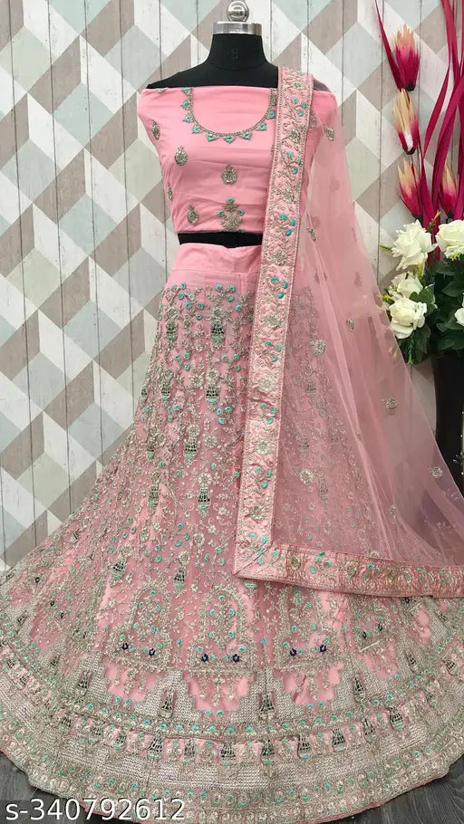 Heavy pink net Lehenga-Choli with embroidery work, semi-stitched blouse, and dupatta. Perfect for festive occasions, traditional or casual events. Indian designer embellishments