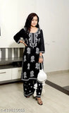 Rayon embroidered women's & girl's kurta & Palazzo set, three-quarter sleeves, embellished net design. India origin