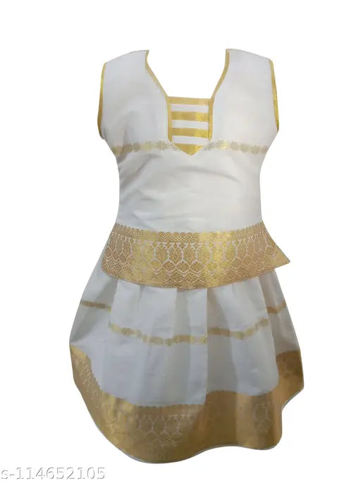 Traditional Kerala cotton silk lehenga choli set for girls aged 6-8 years, solid pattern on display