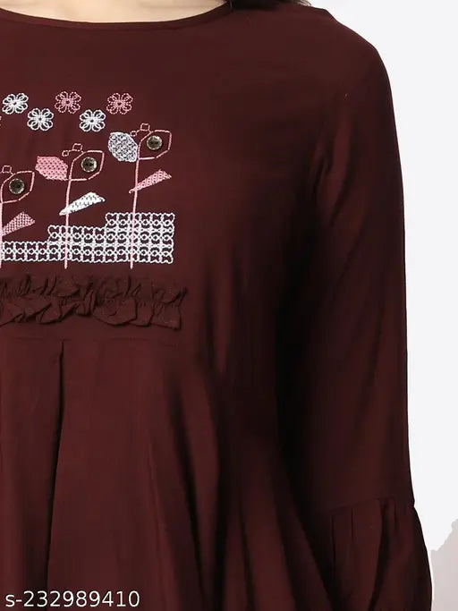 Maroon rayon ethnic motif boat neck tunic, three-quarter sleeves, embroidered net, designed by experienced Indian designer