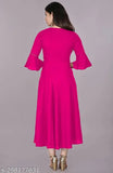 Pink rayon Anarkali kurti with round neck and three-quarter bell sleeves. Traditional Indian attire in solid color, suitable for women and girls. Rayon fabric originates from India