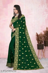 Green Georgette saree with heavy embroidery and full stone work, Zari woven pattern on display