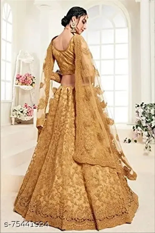 Embroidered net Adrika Lehenga set with semi-stitched dupatta and choli, featuring diamond work and silk lining. Indian bridal wear