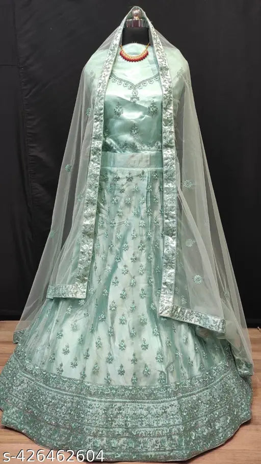 Heavy diamond-work lehenga choli set with 2.5m dupatta, embroidered net fabric, ideal for regular occasions and functions. Indian-made bridal wear