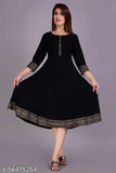 Women's solid rayon anarkali kurti with black printed border, three-quarter sleeves. Rayon fashion outfit on mannequin