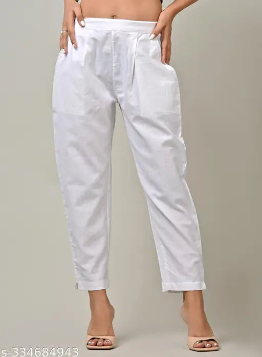 White and green combo cotton casual trousers set of 2 for women/girls, featuring pleats detailing, side pockets, and ankle length bottom fold. Comfortable and versatile for daily wear, work, office, travel, or casual occasions. Made of 100% cotton from India