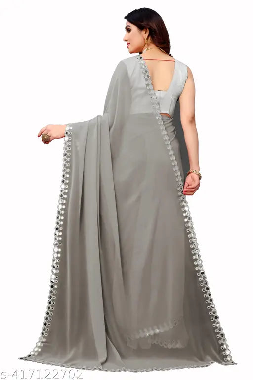 Handmade Georgette saree with Aari work, solid pattern and running blouse, accentuating Indian elegance and grace