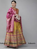 Embellished Banarasi silk lehenga-choli and dupatta, Indian wedding attire with intricate detailing