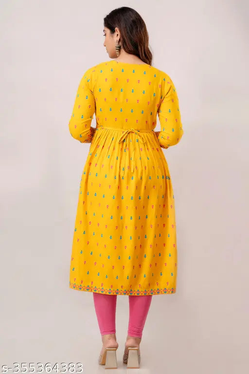 Yellow rayon kurti with side slits Naira cut, ideal for haldi ceremonies and festive wear