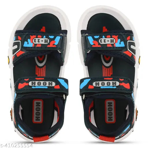 Dark blue, embellished net indoor-outdoor shoes for boys aged 15 years. Durable rubber sole and Velcro fastening