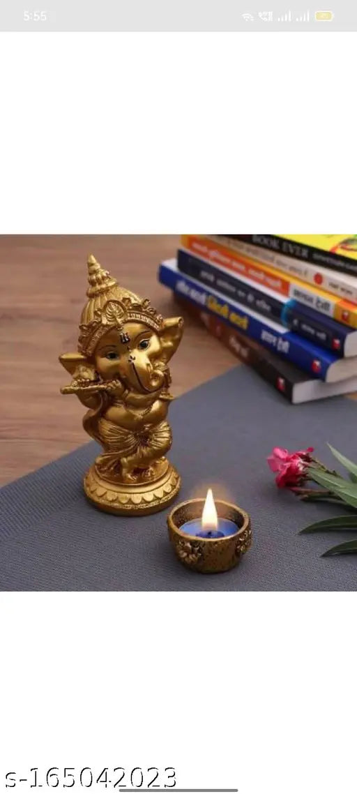 Golden polyresin Ganesh idol with bansuri, 6" tall, perfect for home decor or gift