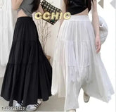 Rayon black and white solid woman skirt, fashionable black and white attire for women, Indian-origin clothing on hanger