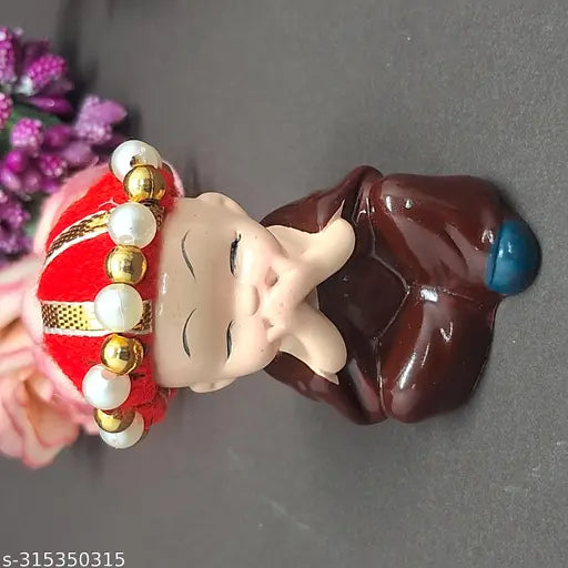 Multicolor polyresin baby monk Buddha idols (4 pieces) - Handcrafted Indian home decor with positive energy