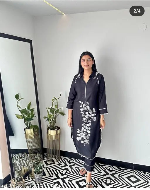 Rayon floral embroidered A-line kurta, solid green balloon fit sleeves dress with palazzos bottomwear for women, India origin