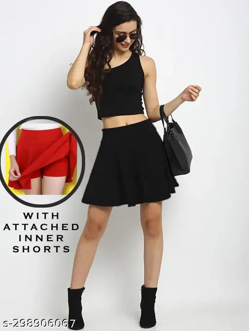 Cotton blend flared mini skirt with attached short, solid net pattern, high waist and stretch fabric. Suitable for various occasions, available in sizes 26-36 inches. Indian origin