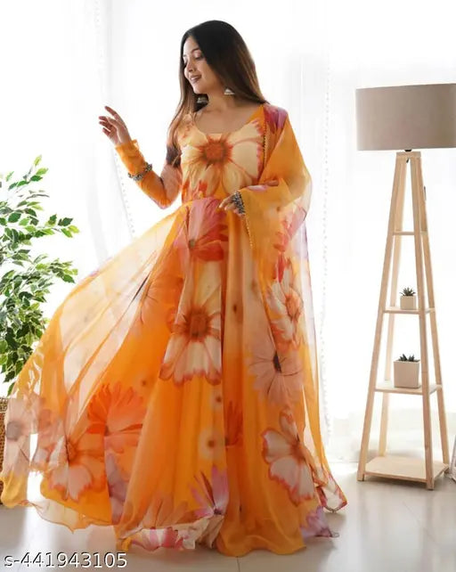Orange georgette full sleeve gown dress with floral print, suitable for traditional marriage wear and various events