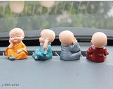Multicolor handicrafted monk set of 4, perfect for home decor or car dashboard idols