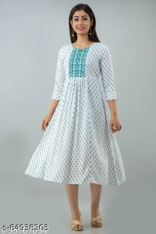 White printed anarkali kurti, rayon fabric with three-quarter sleeves, vibrant Indian fashion on mannequin