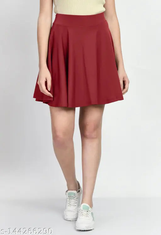 Polyester solid-color skater skirt with attached inner shorts, perfect for everyday wear and trendy outfits. Comes in sizes 26, 28, 30, 32, from Klart, India