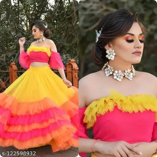 Multi-color designer net lehenga choli set, featuring yellow, orange, and pink hues. Semi-stitched butterfly net lehenga with altra satin blouse and lace details