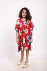 Short-sleeved printed rayon kaftan dress for 4-7 years, featuring pom pom lace and tassels, perfect for summer outings or home wear