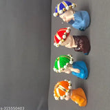 Multi-colored polyresin baby monk Buddha idols (4 pcs), vibrant decor for home, office & car