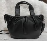 Black faux leather sling bag with adjustable strap, Chunnat pattern for women and girls. Solid net construction, free size, made in India