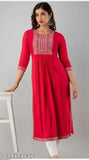 Red rayon embroidered Naira cut kurta with three-quarter sleeves, perfect for Indian festivals and events. Stylish women's attire made in India." (124 characters)