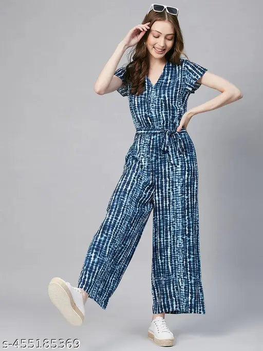 Blue striped rayon jumpsuit for women, v-neck and short sleeves, features side pockets. Ideal for office wear or business casual style, can be paired with heels, clutch, and fringe earrings. Made in India