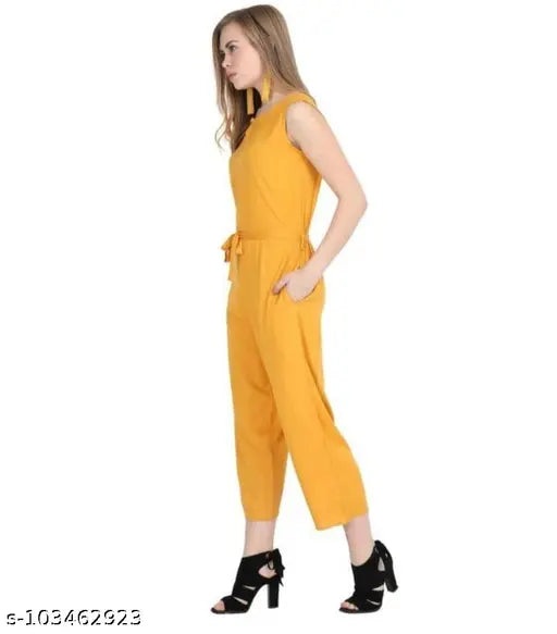 Sleeveless poly crepe jumpsuit, regular wear in solid net, size S (34in bust, 29in waist, 46in length)