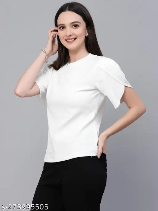 White poly knit smart casual top, solid pattern, short sleeves, made of polyester, flattering high neckline and tulip sleeves, fits sizes S-XL, India origin