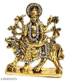Golden antique Durga statue on car dashboard, Indian handcrafted religious figure