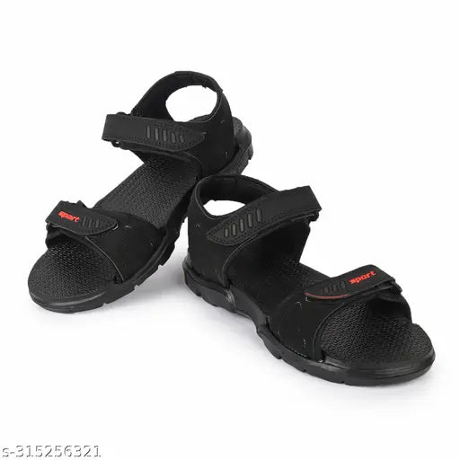 Black synthetic sandal for kids by XDOX, ideal for ages 5-11, featuring Velcro fastening. Comfortable casual footwear for boys and girls." (97 characters)