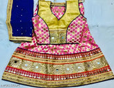 Wine-colored tissue dupatta Chanderi cotton Chaniya Choli for girls, features three-quarter sleeves and floral stitch. Soft, lightweight, and adorned with mirror border, suitable for various events like Diwali, Holi, or Rakshabandhan